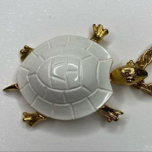 “Act II” signed White Turtle pendant and chain link necklace